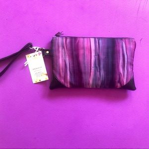Brand new never used. Medium sized handmade clutch